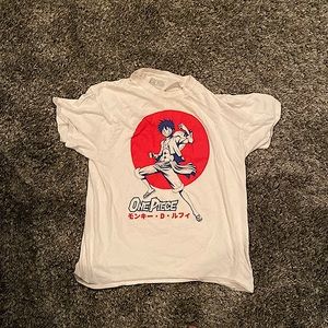 I’m selling a one piece t-shirt, the brand is Ripple Junction, and it is size L